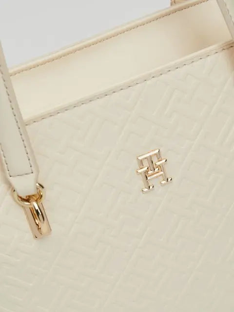 Tommy Hilfiger bež ženska torba sa perforiranim detaljima-[SKU]