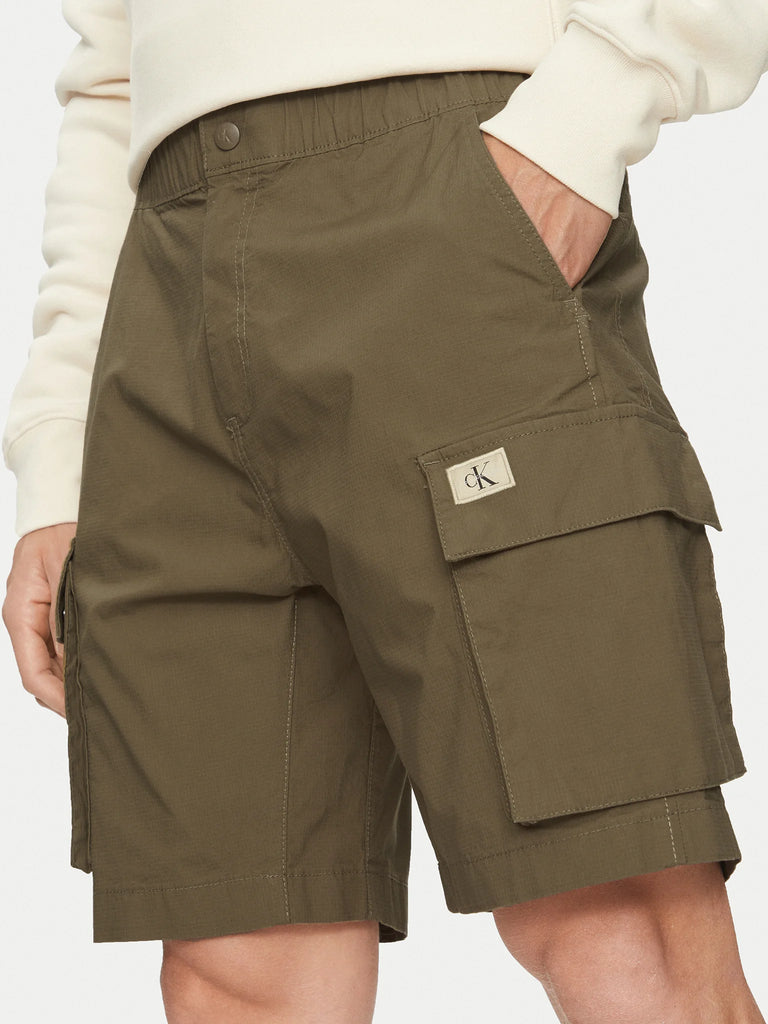 Calvin Klein zeleni muški šorc s bočnim džepovima-[SKU]
