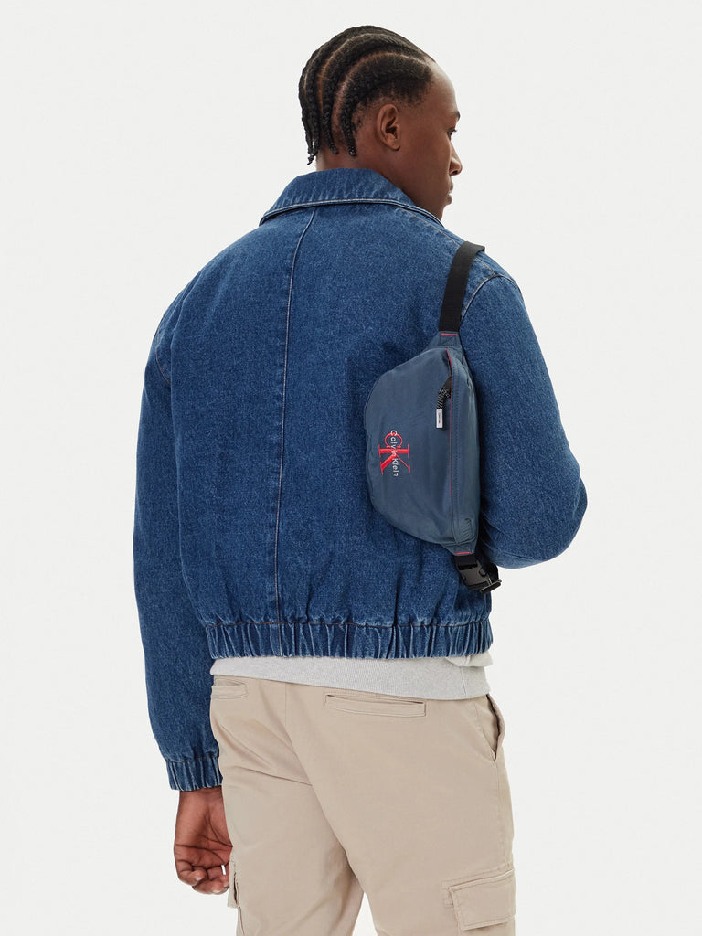 Calvin Klein plava muška torba sa crvenim detaljima-[SKU]