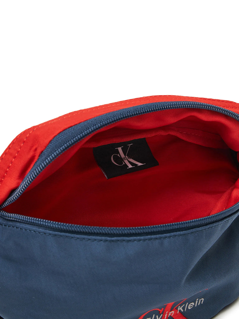 Calvin Klein plava muška torba sa crvenim detaljima-[SKU]