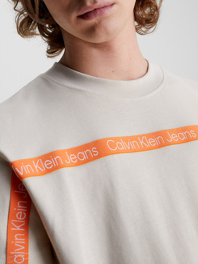 Calvin Klein bež muška majica s narančastim rukavima