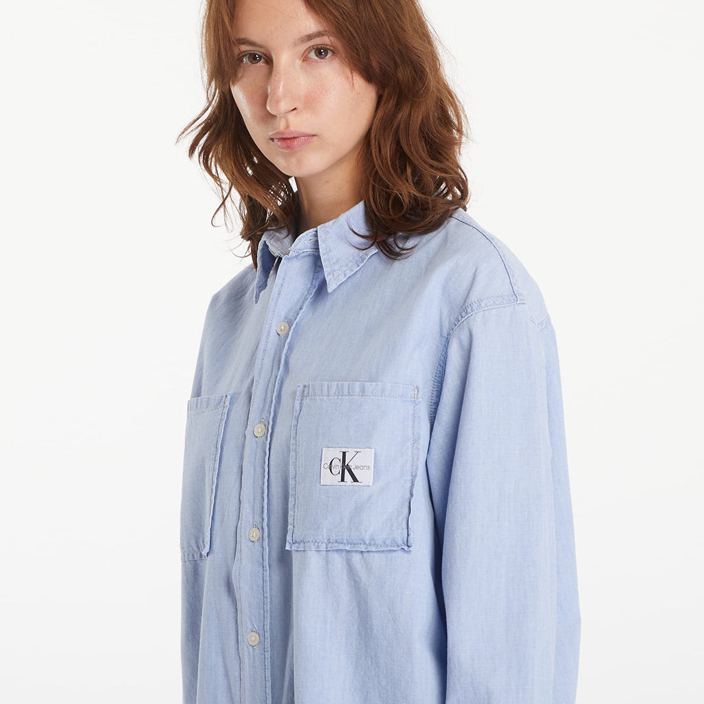 Calvin Klein plava ženska košulja s džepom-[SKU]