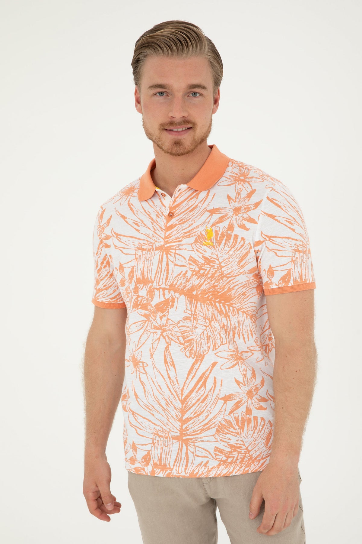 U.S. Polo Assn. muška polo majica boje lososa s cvjetnim printom