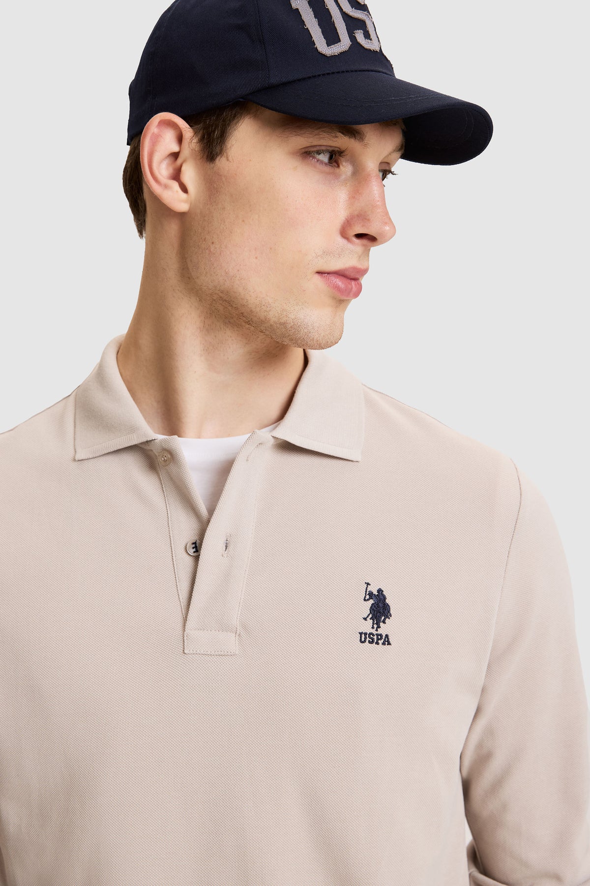 U.S. Polo Assn. bež muška polo majica dugih rukava s teget logom