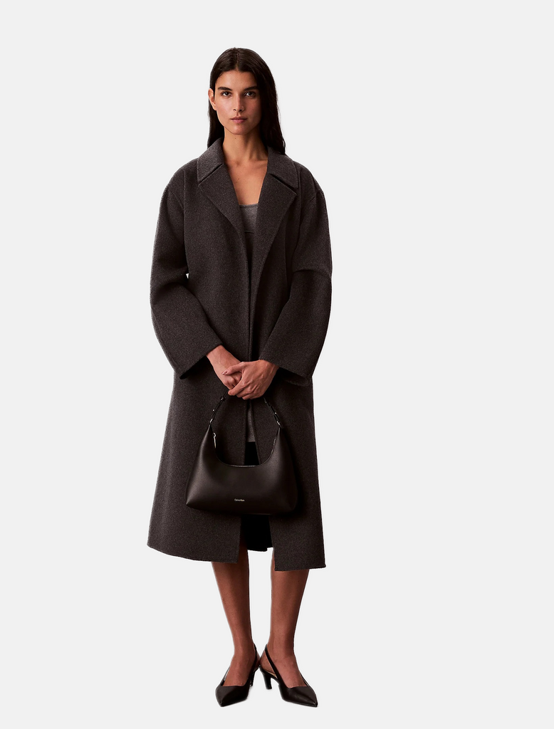 Calvin Klein crna ženska torba sa zlatnim detaljima-[SKU]