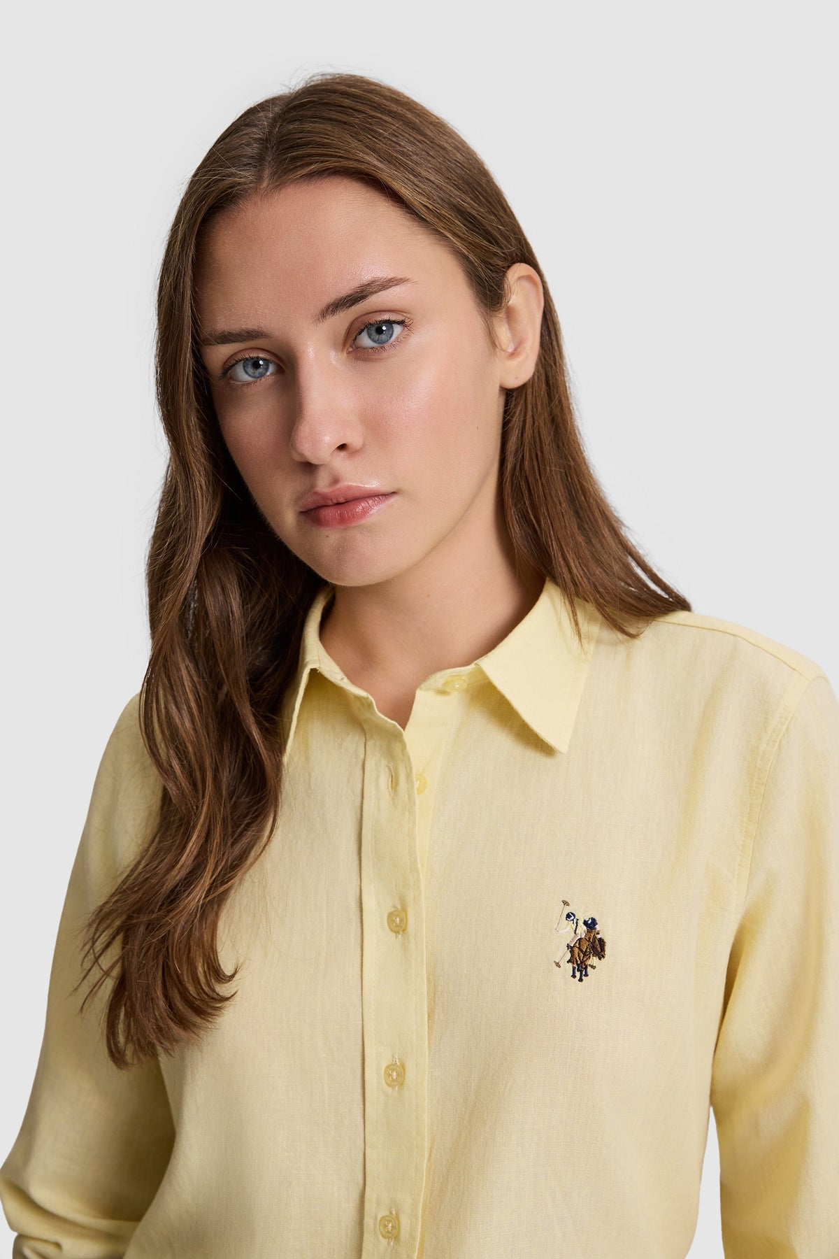U.S. Polo Assn. svijetložuta ženska košulja na tanke pruge s vezenim logotipom