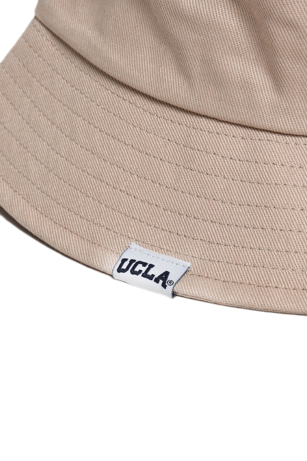 UCLA bež unisex šešir bucket s tamno plavim UCLA natpisom