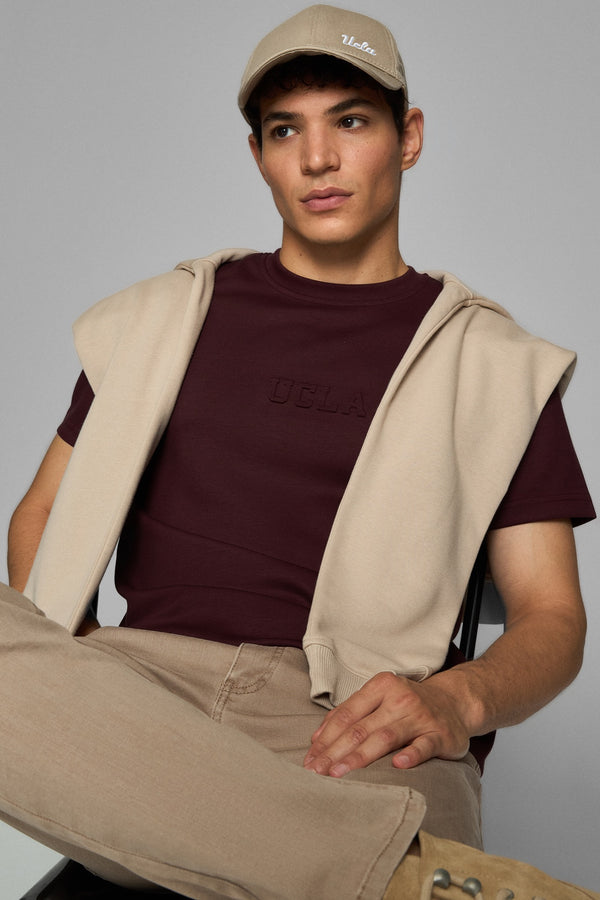 UCLA bež unisex kapa s malim vezenim UCLA logom i klasičnim štitnikom