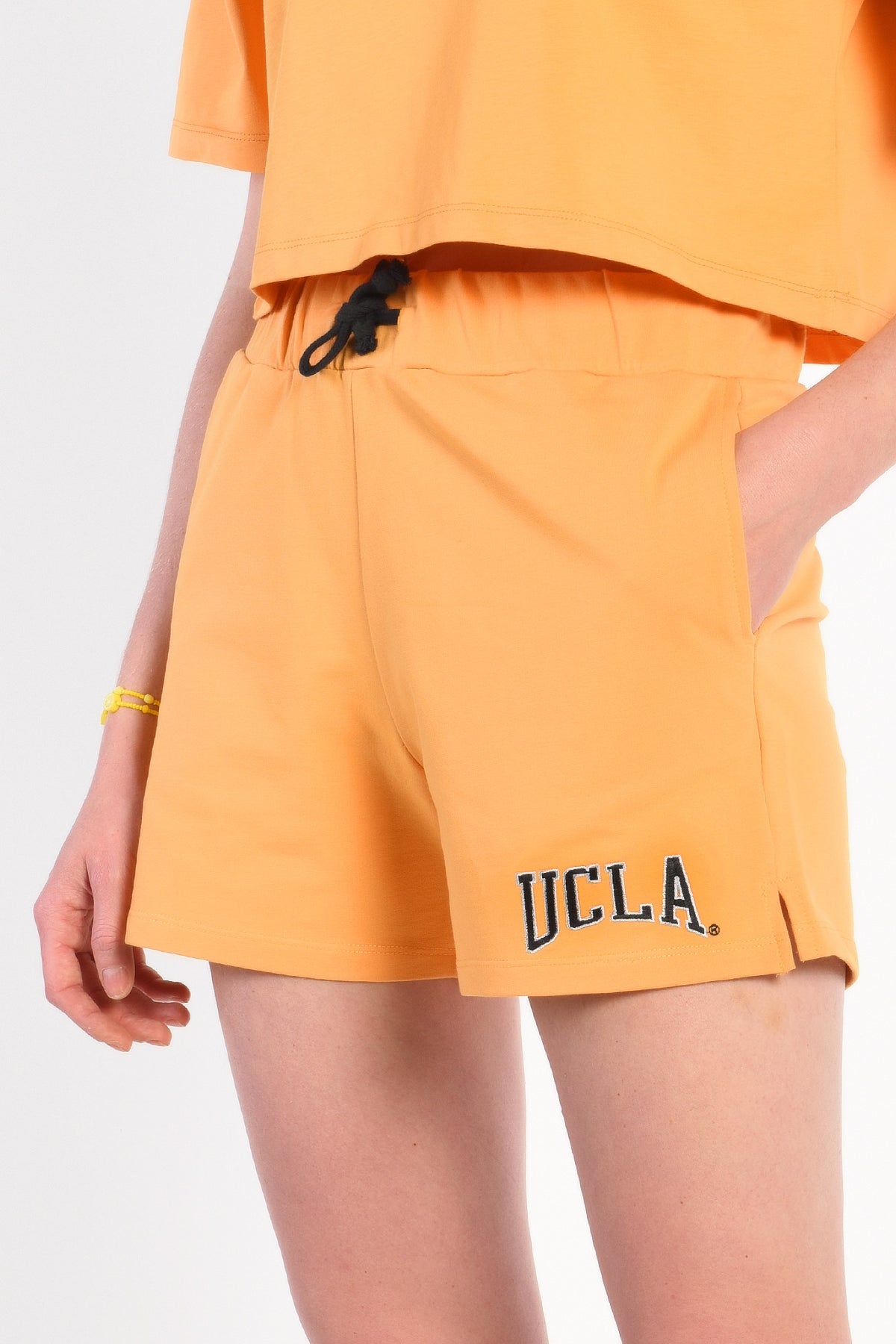 UCLA narandžasti ženski šorc od trikotaže s UCLA natpisom