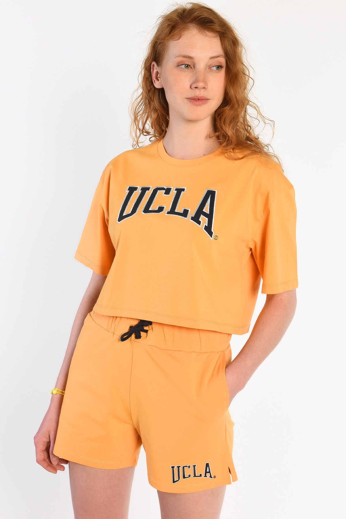UCLA narandžasti ženski šorc od trikotaže s UCLA natpisom