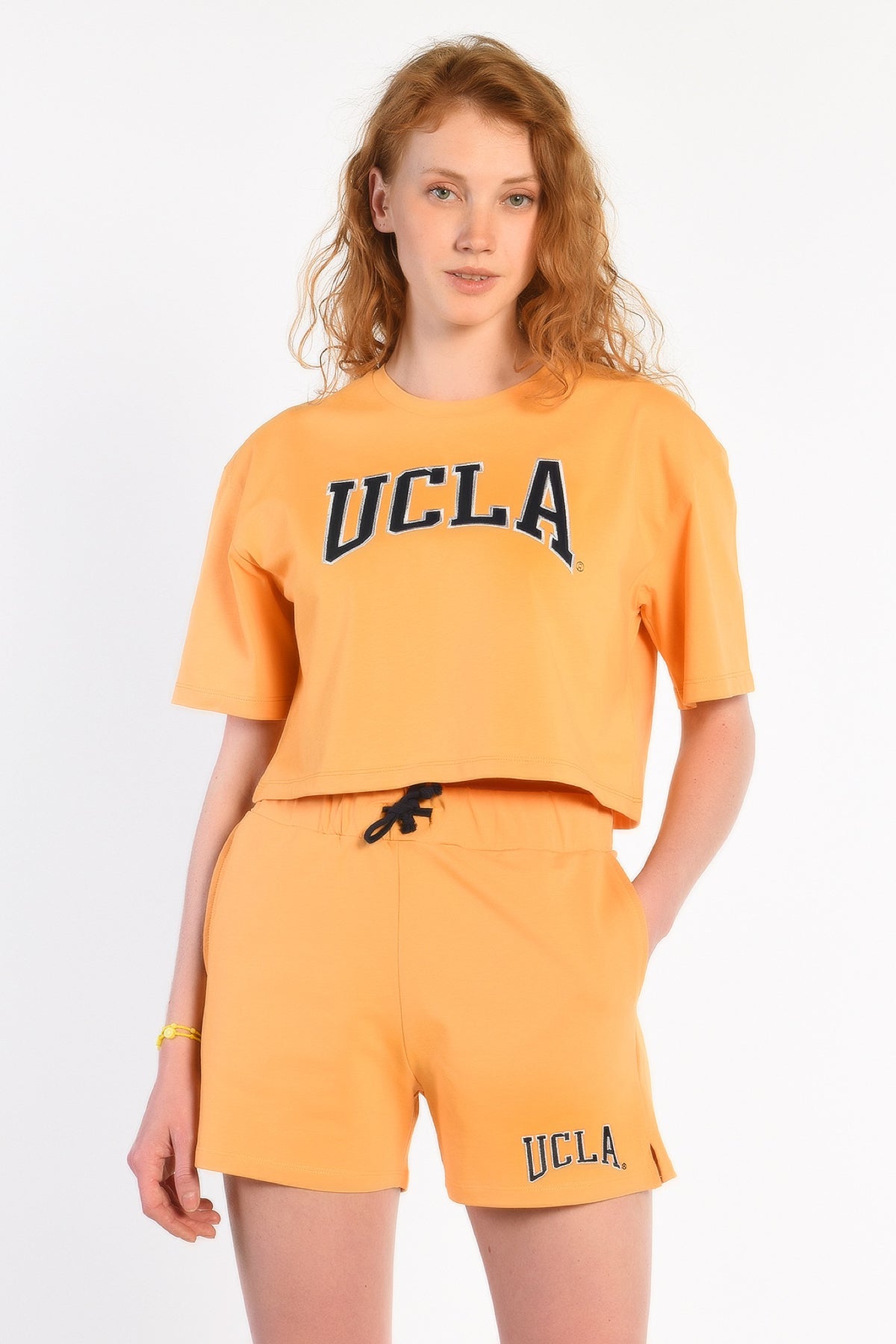 UCLA narandžasti ženski šorc od trikotaže s UCLA natpisom
