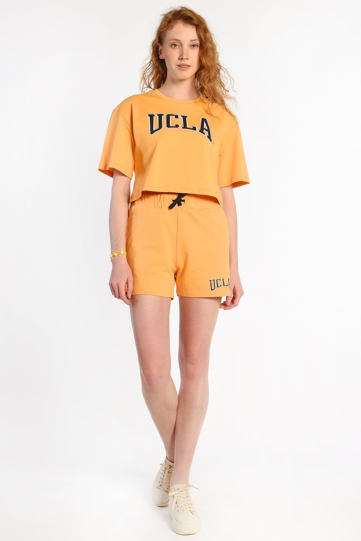 UCLA narandžasti ženski šorc od trikotaže s UCLA natpisom