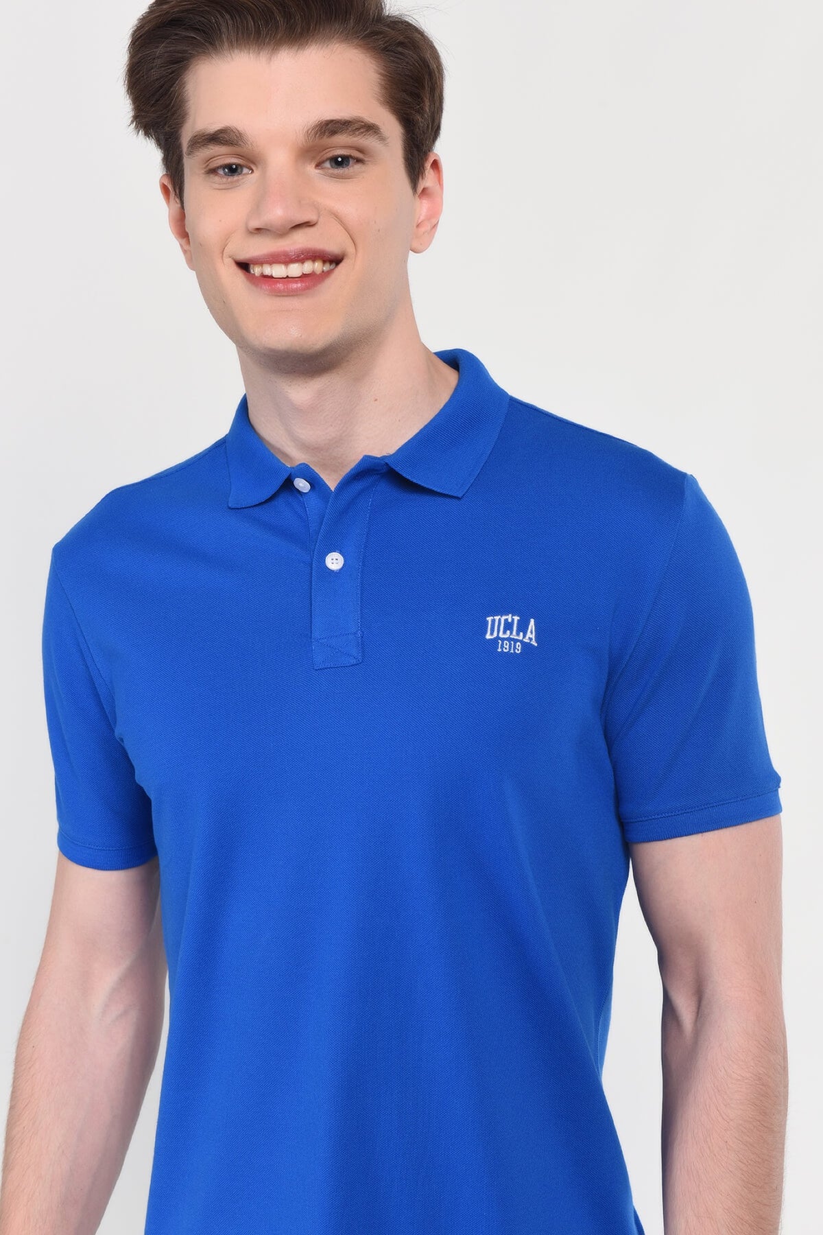 UCLA plava muška polo majica kratkih rukava s malim UCLA 1919 logom