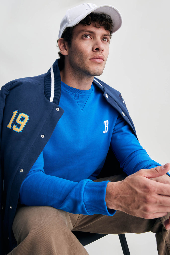 UCLA plava muška jakna sa brojem 19 i prugama