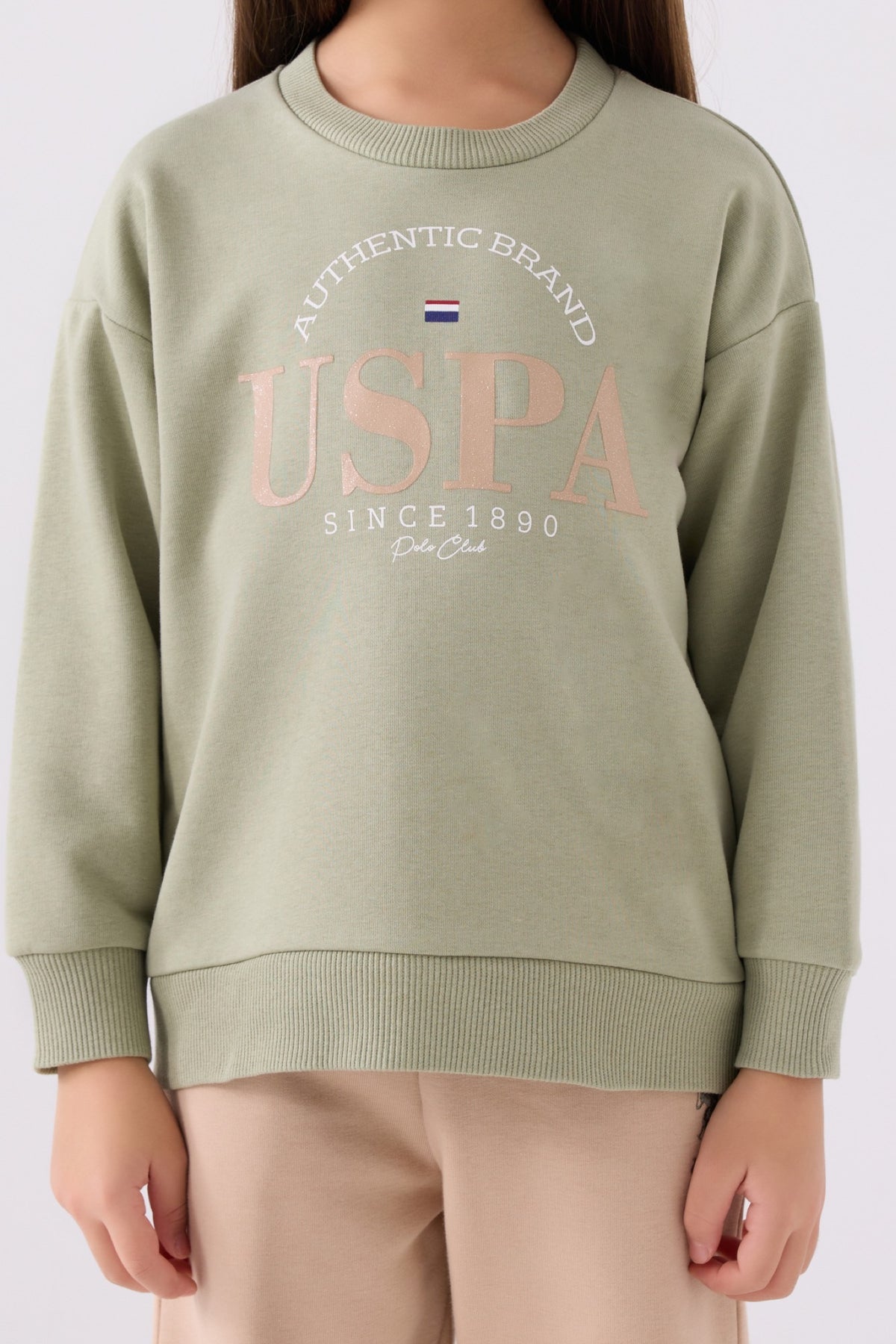 U.S. Polo Assn. zelena trenerka za djevojčice s USPA printom i bež hlačama