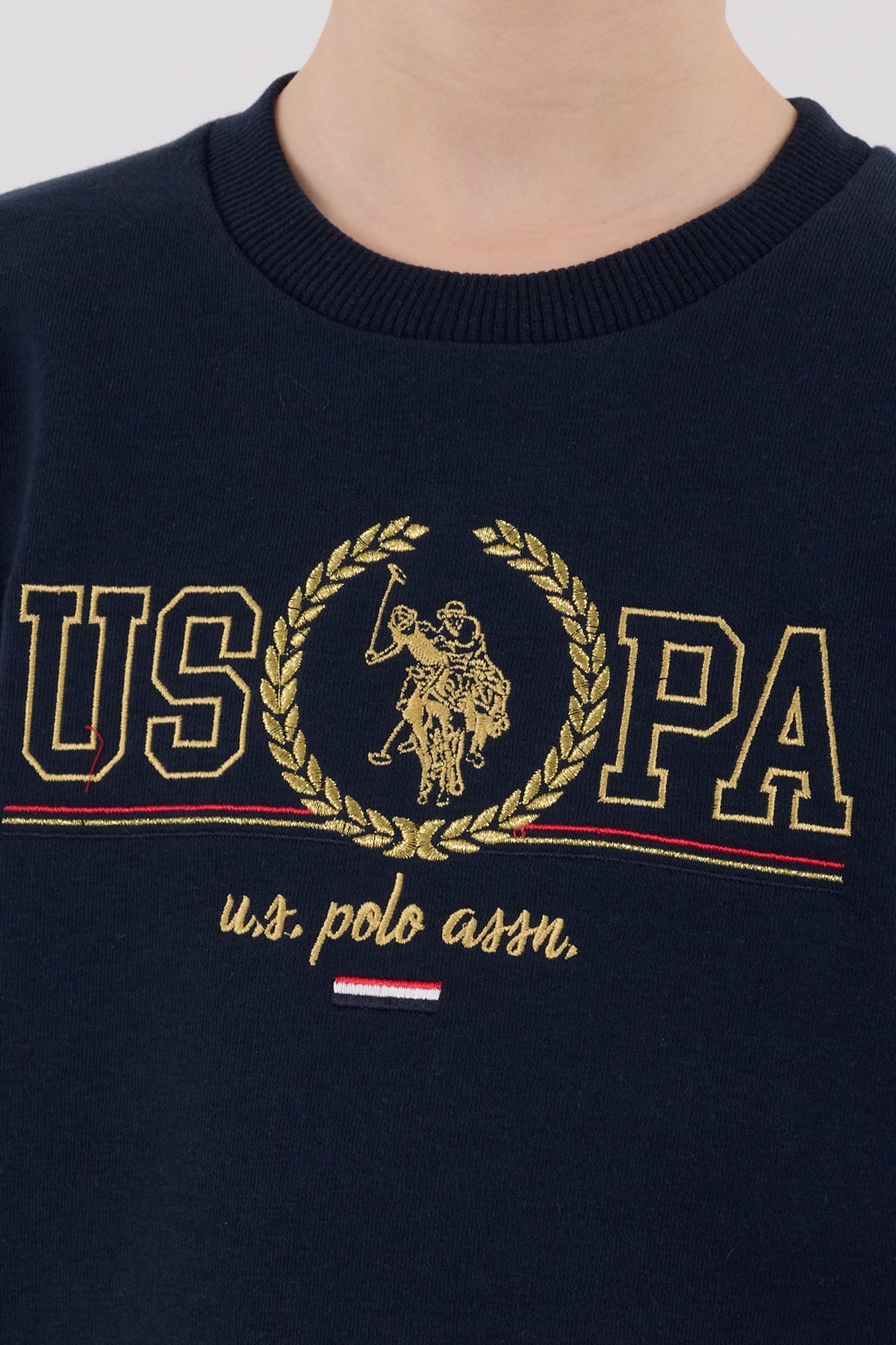U.S. Polo Assn. teget plava trenerka za dječake sa zlatnim detaljima