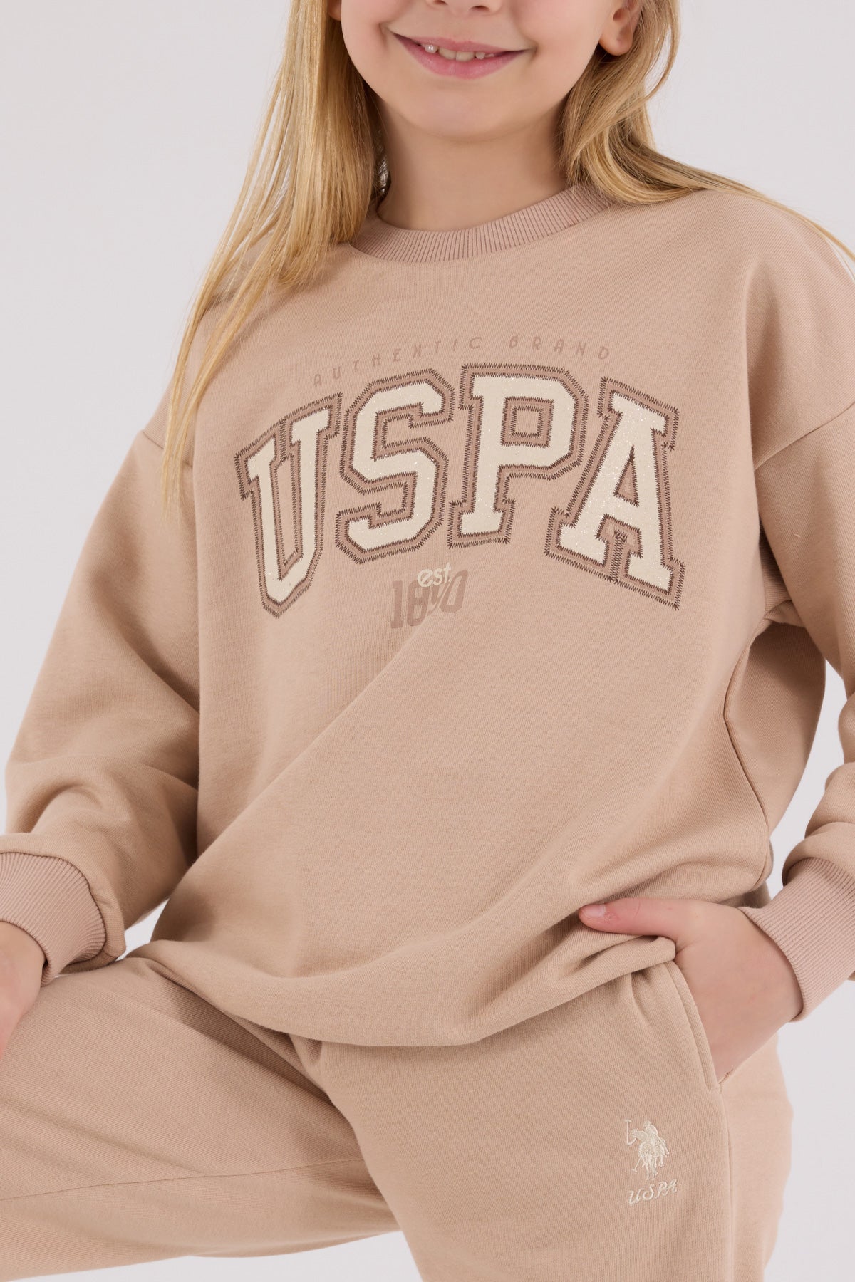 U.S. Polo Assn. bež trenerka za djevojčice sa natpisom