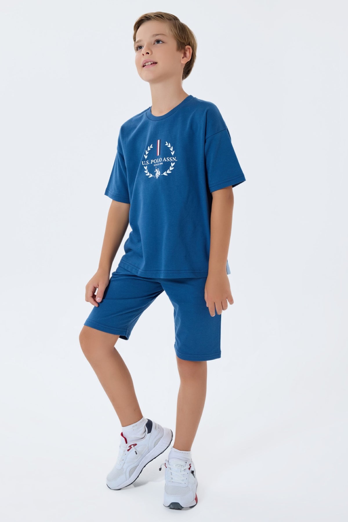 U.S. Polo Assn. plavi komplet majice s printom lovorovog vijenca i šorca za dječake