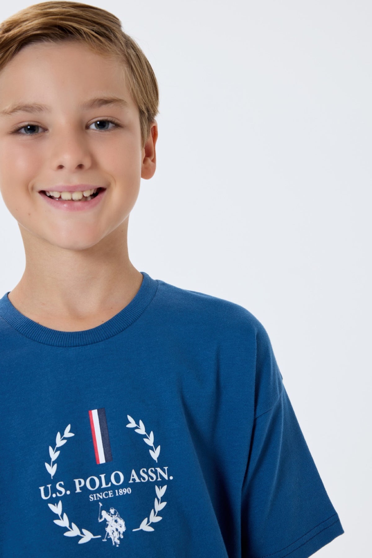 U.S. Polo Assn. plavi komplet majice s printom lovorovog vijenca i šorca za dječake