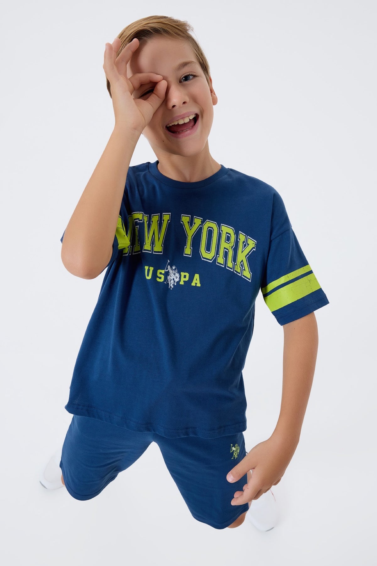 U.S. Polo Assn. plavi komplet majice s New York printom i šorca za dječake