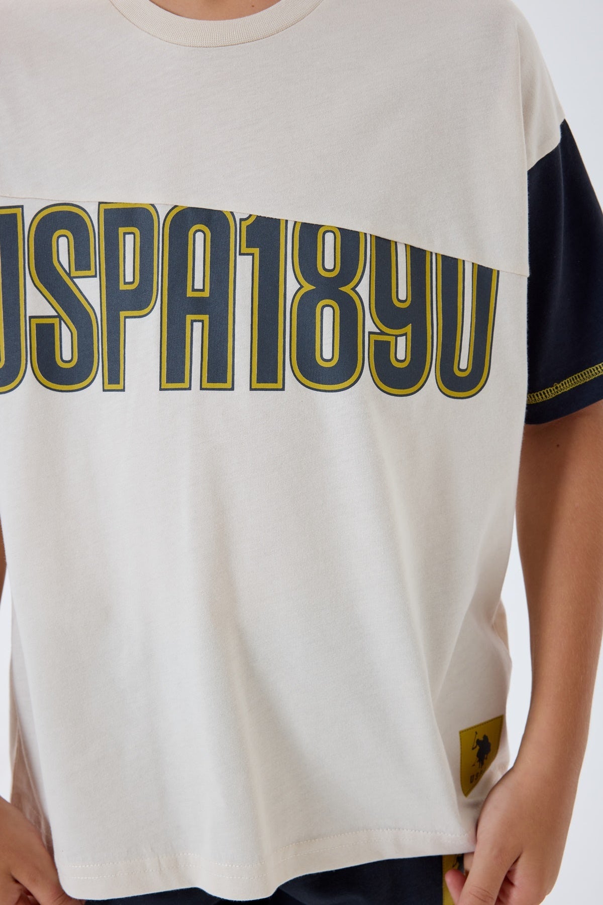 U.S. Polo Assn. bež komplet za dječake s kratkim rukavima