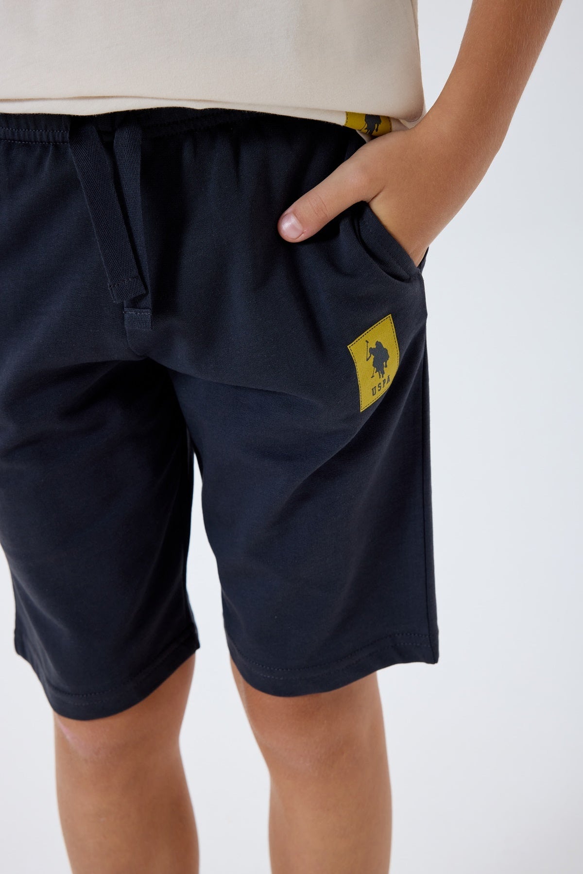 U.S. Polo Assn. bež komplet za dječake s kratkim rukavima