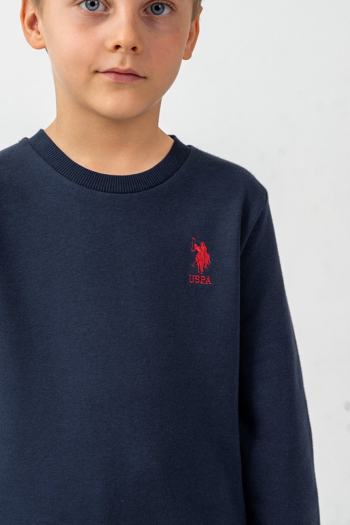 U.S. Polo Assn. teget komplet trenerke za dječake s crvenim vezenim logom