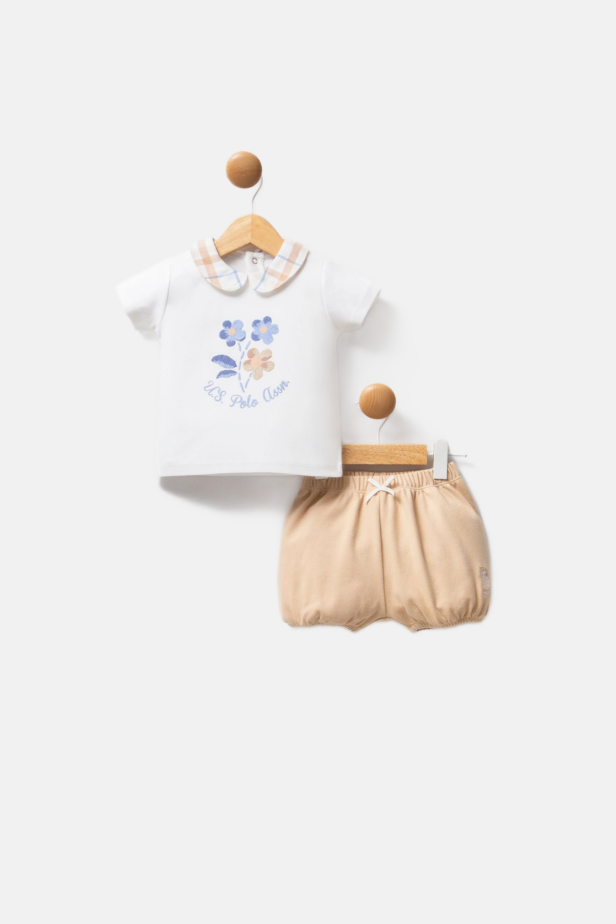 U.S. Polo Assn. bijeli komplet za bebe s cvjetnim motivom