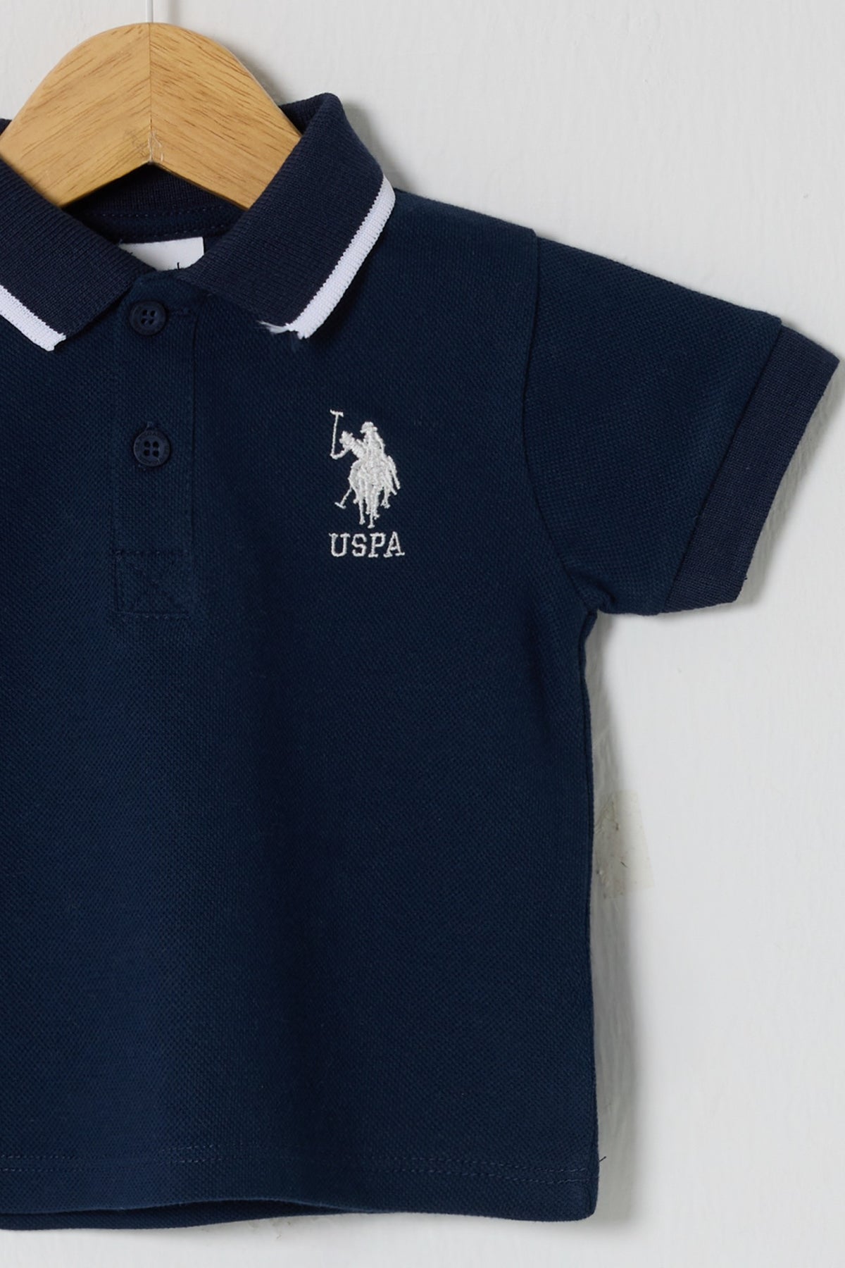 U.S. Polo Assn. teget majica za bebe s polo kragnom i bijelim rubom