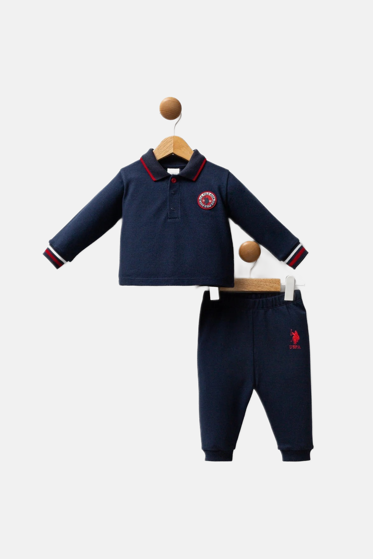 U.S. Polo Assn. teget plava trenerka za dječake s polo kragnom i okruglom oznakom