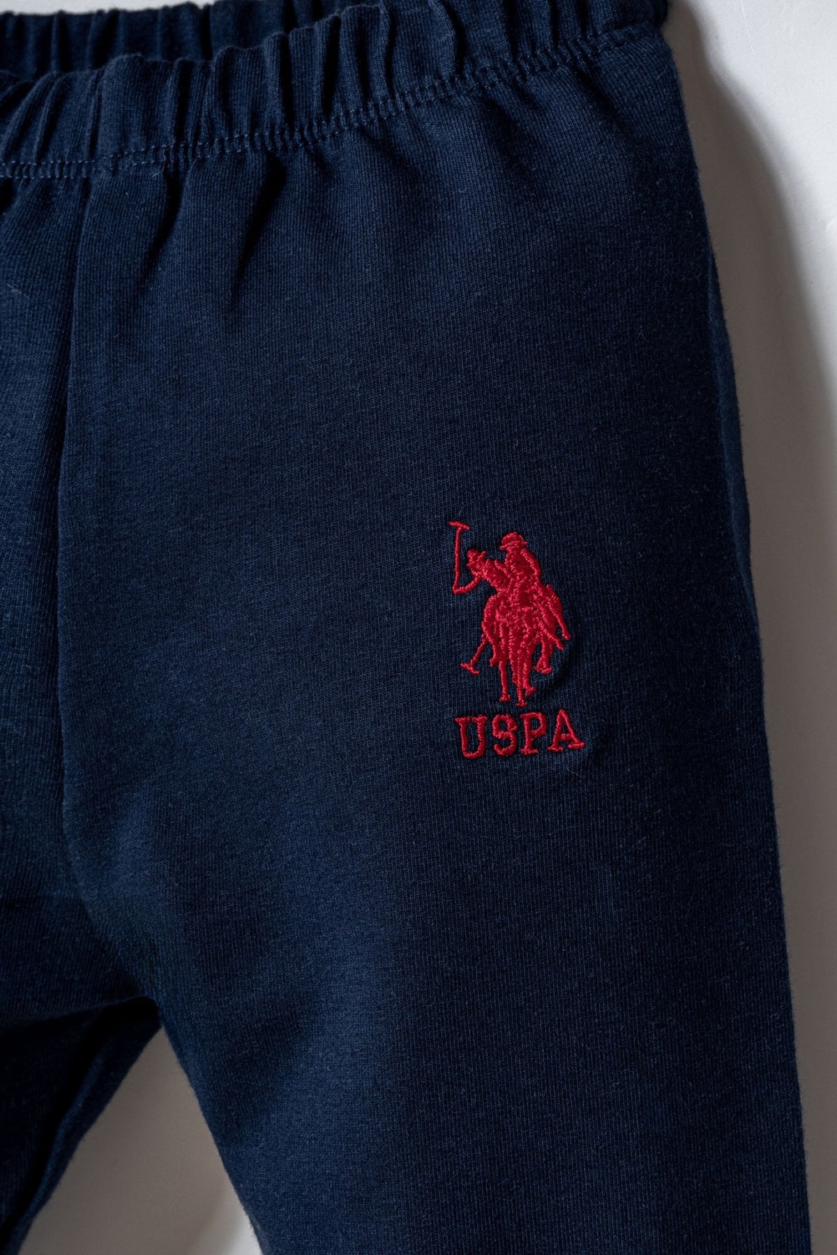 U.S. Polo Assn. crvena trenerka za bebe od 3 dijela s teget raglan rukavima