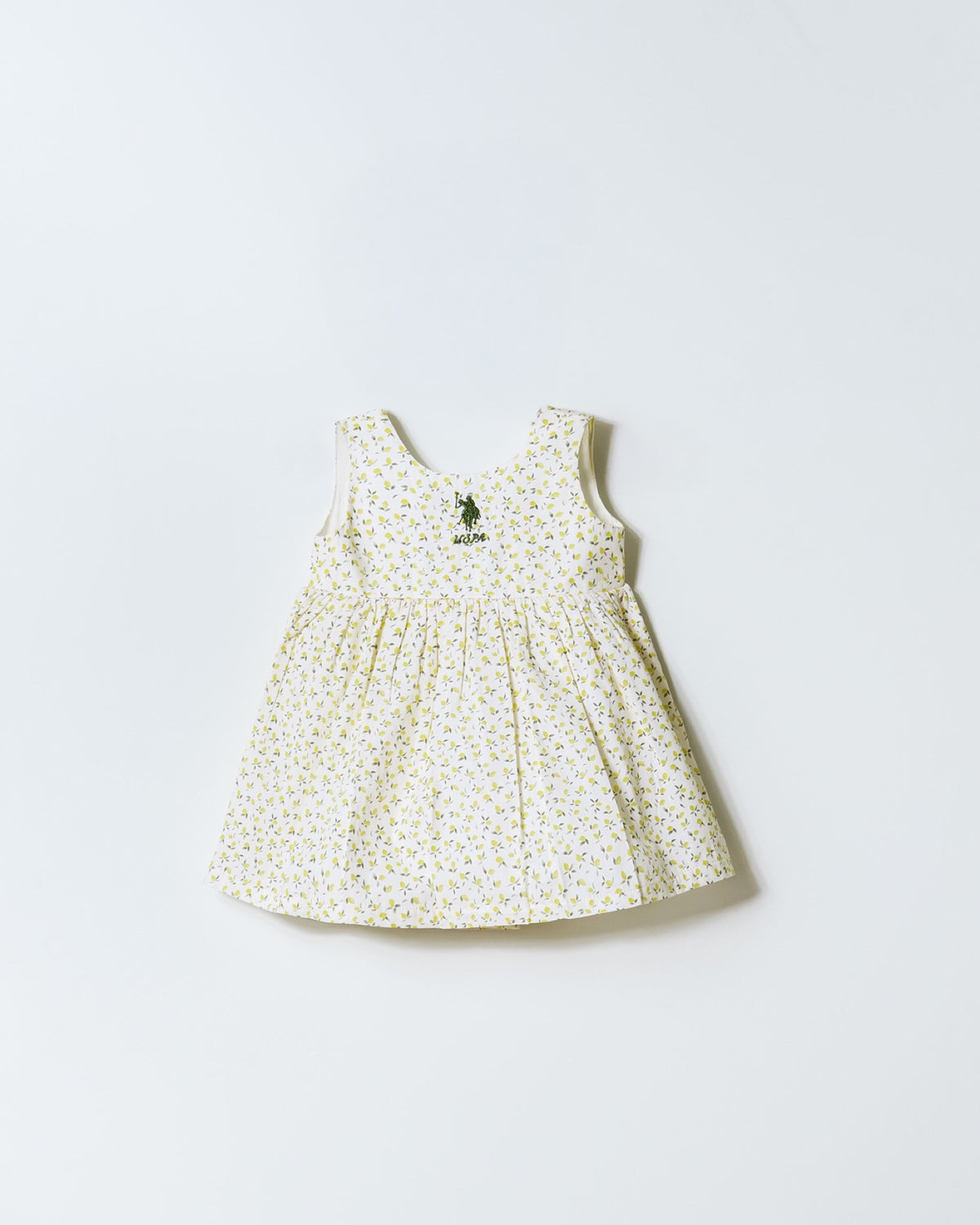 U.S. Polo Assn. ekru haljina za bebe s printom limuna