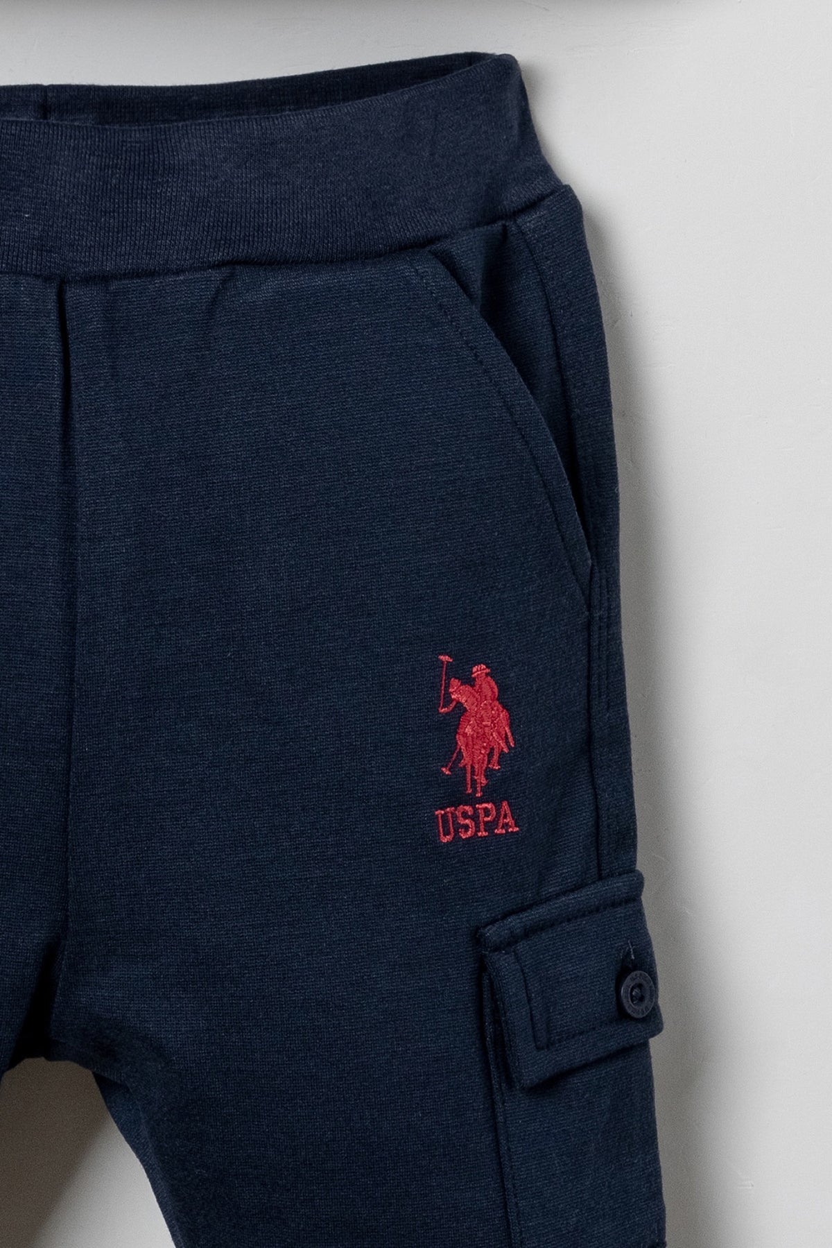 U.S. Polo Assn. teget komplet trenerke za bebe s prugastom polo majicom i cargo hlačama