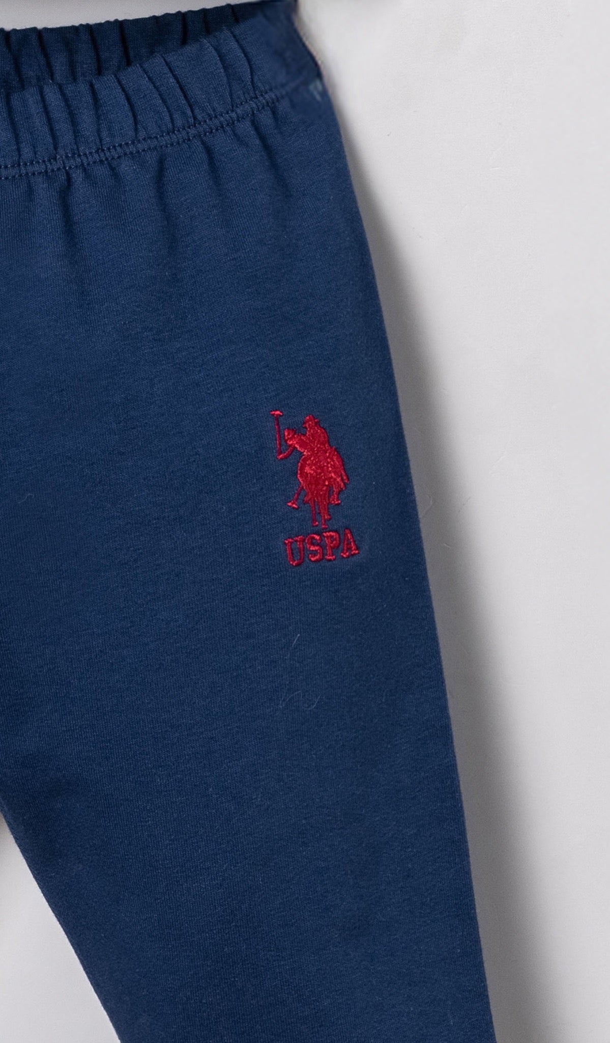 U.S. Polo Assn. teget komplet trenerke za bebe od 3 dijela s crvenom postavom kapuljače