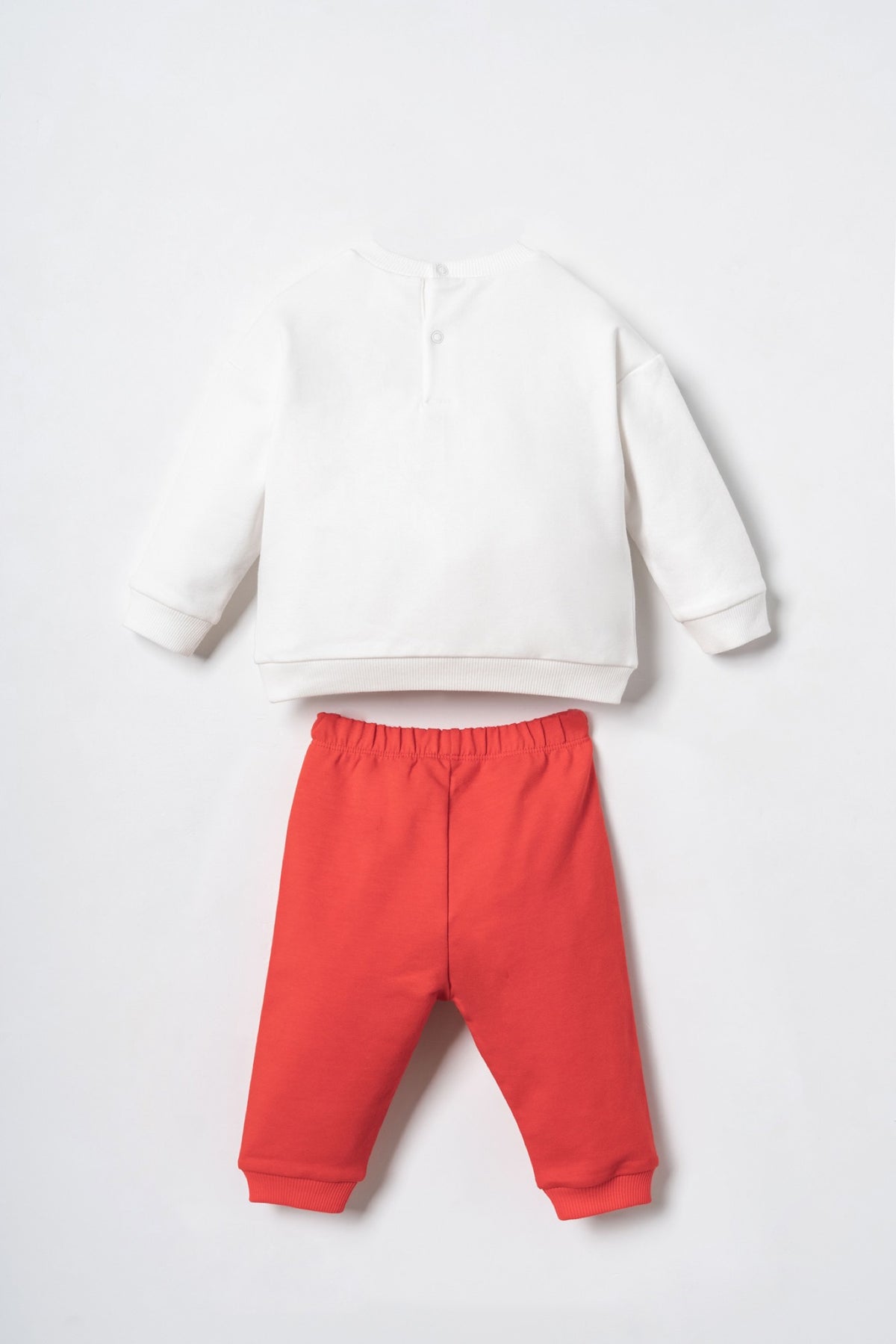 U.S. Polo Assn. bijeli komplet trenerke za bebe s velikim printom i crvenim hlačama