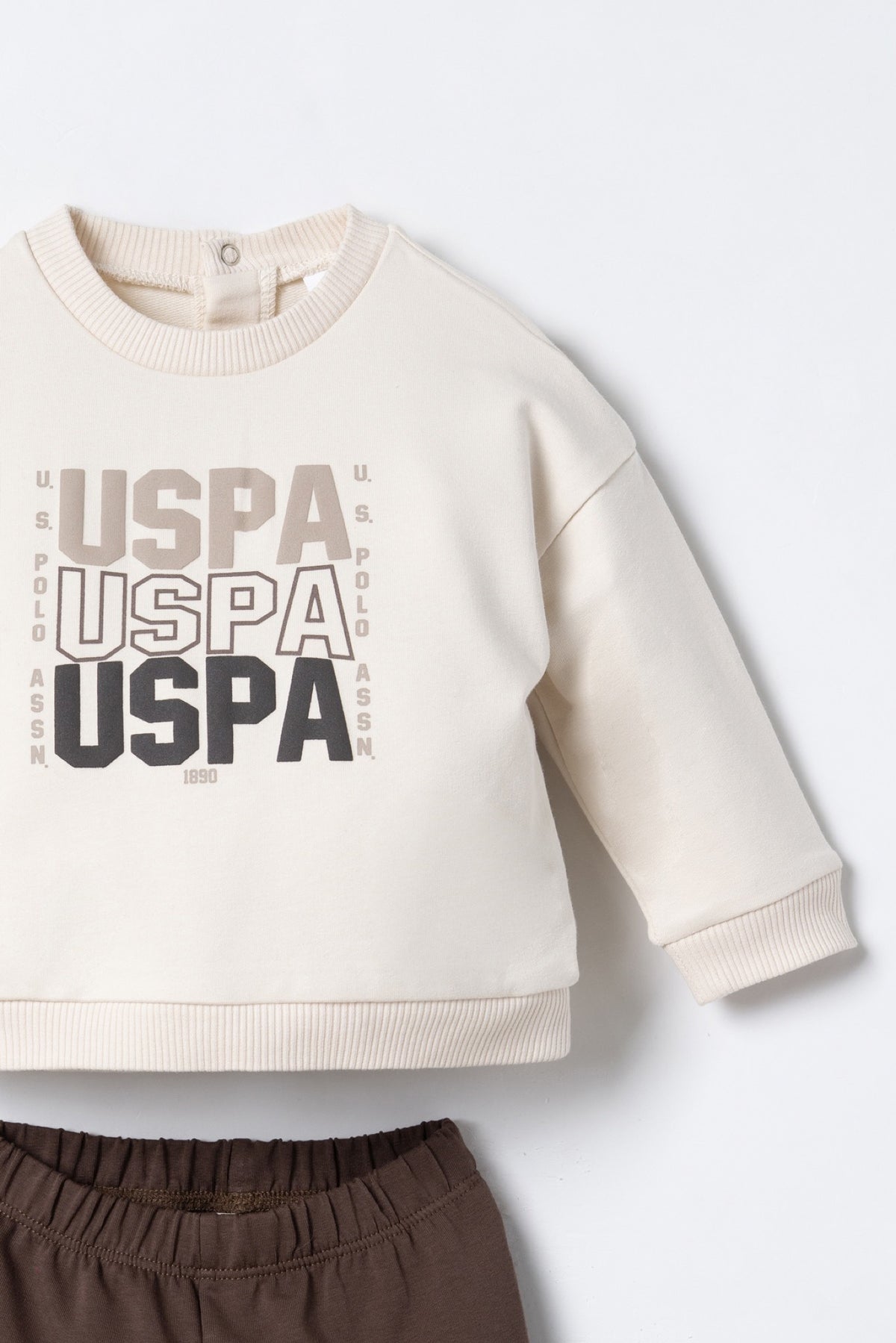 U.S. Polo Assn. bež komplet trenerke za bebe s USPA printom i smeđim hlačama