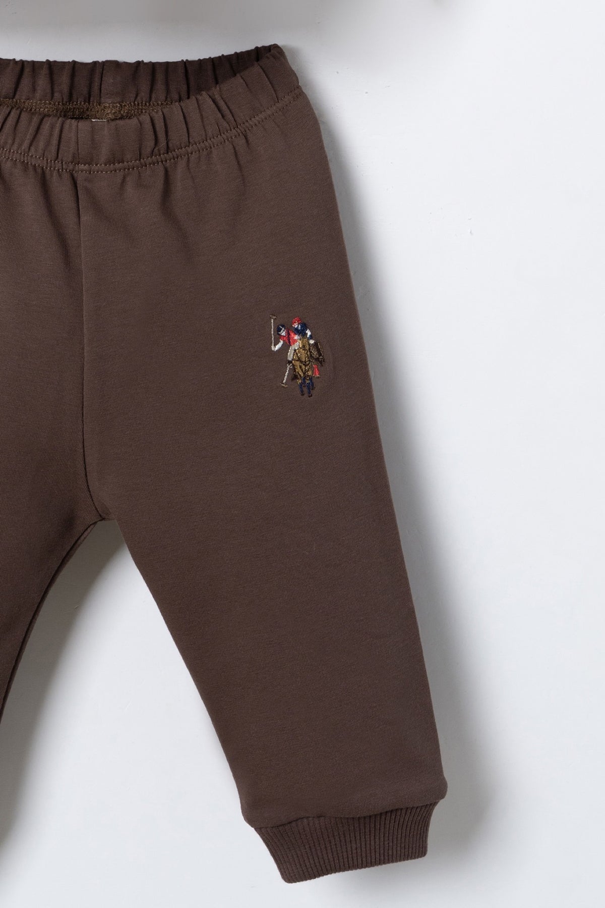 U.S. Polo Assn. bež komplet trenerke za bebe s USPA printom i smeđim hlačama