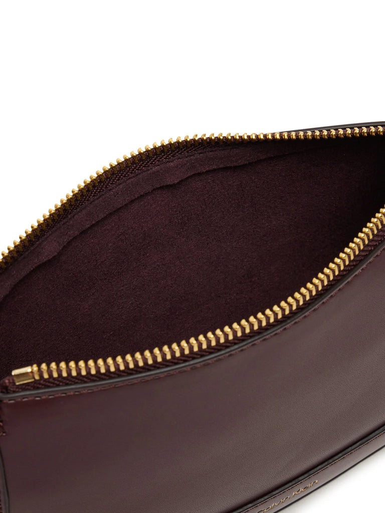 Calvin Klein bordo ženska torba sa zlatnim detaljima-[SKU]