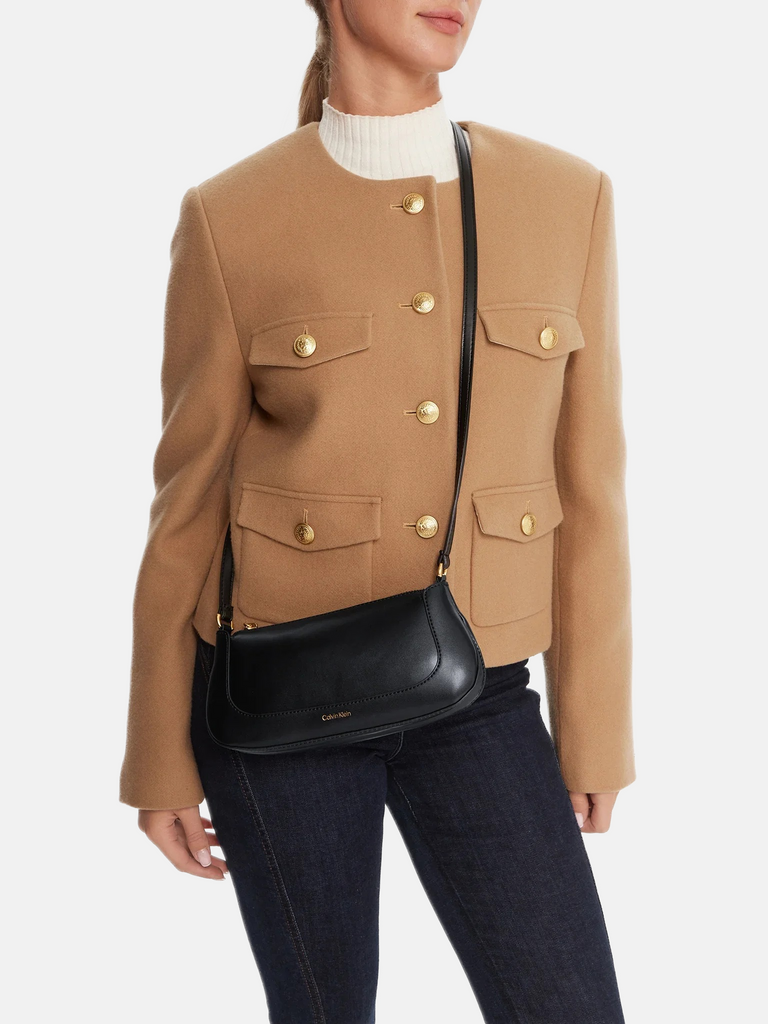 Calvin Klein crna ženska torba sa zlatnim detaljima-[SKU]