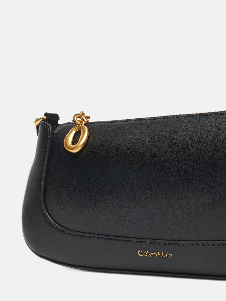 Calvin Klein crna ženska torba sa zlatnim detaljima-[SKU]