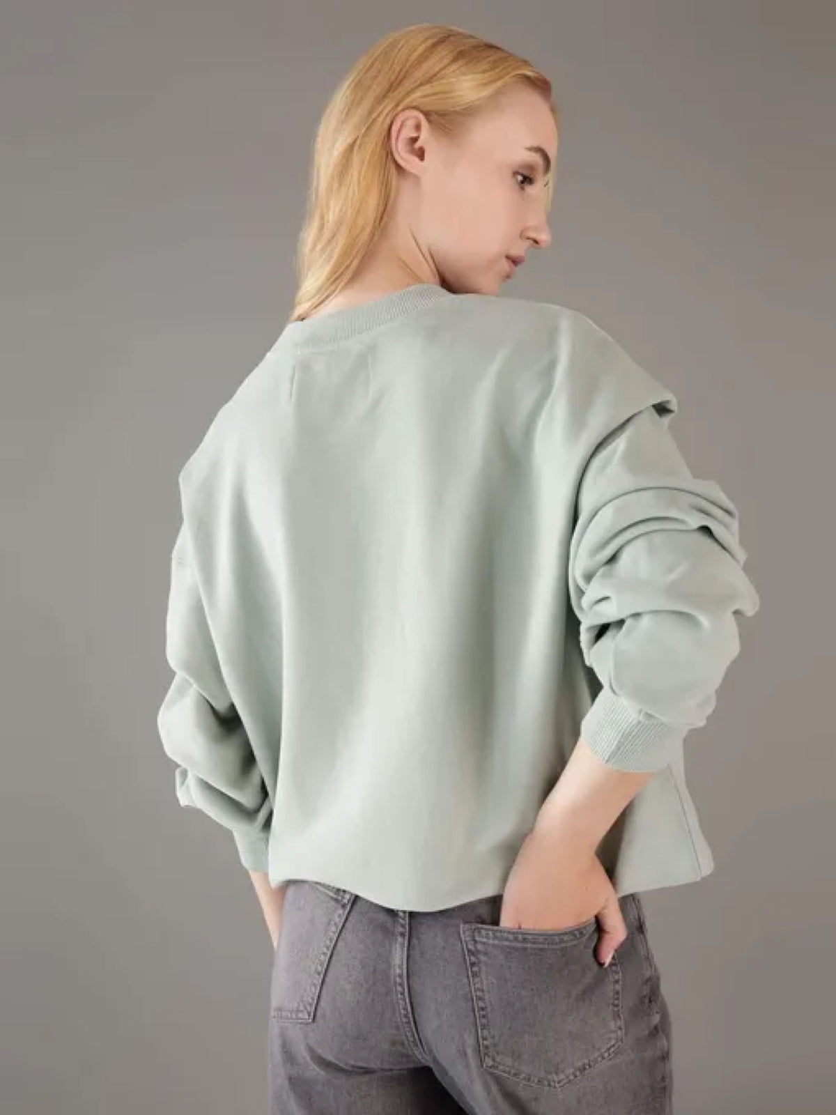 Calvin Klein svijetlo zelena ženska dukserica oversize kroja s printom