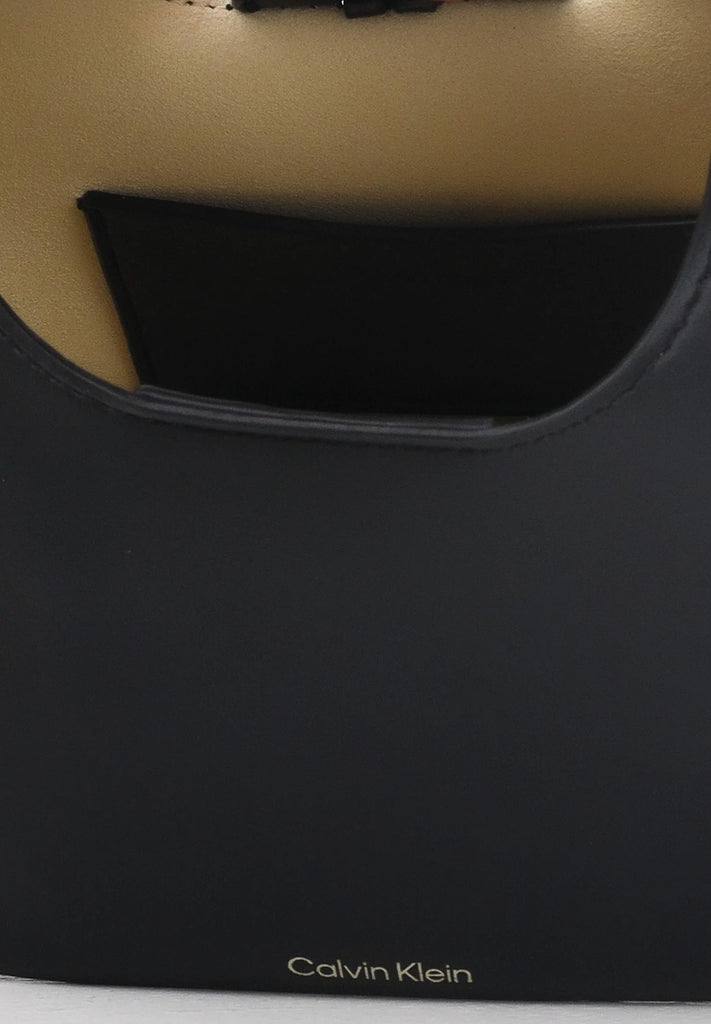 Calvin Klein crna ženska torba sa diskretnim logom-[SKU]