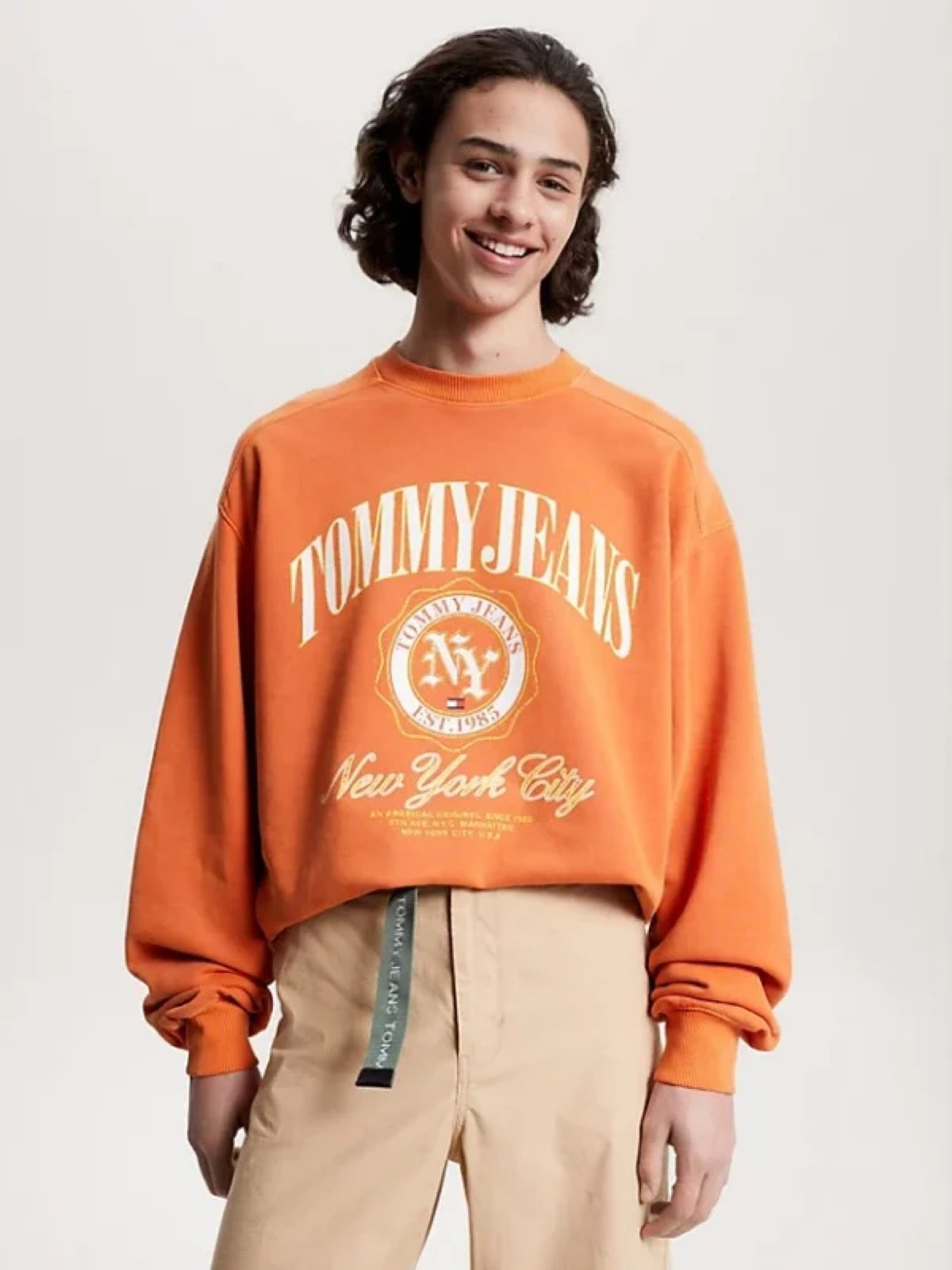 Tommy Hilfiger narandžasta muška dukserica sa Tommy Jeans printom