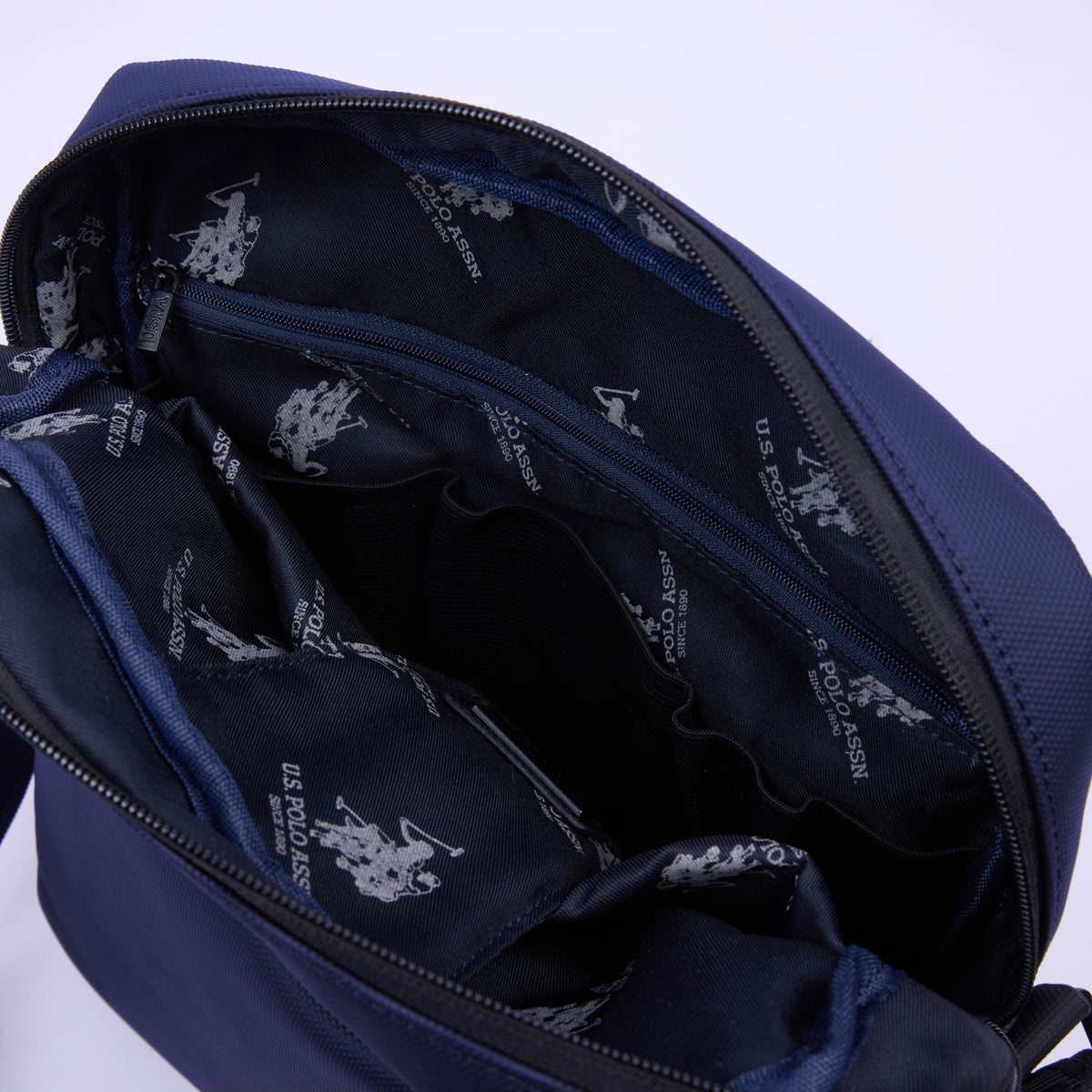 U.S. Polo Assn. teget plava muška torba preko tijela s džepovima