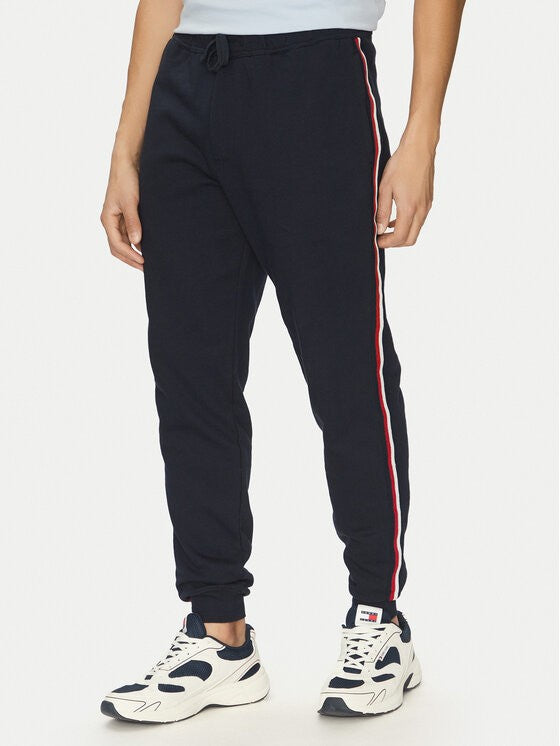 Tommy Hilfiger tamnoplava muška trenerka s bočnom prugom