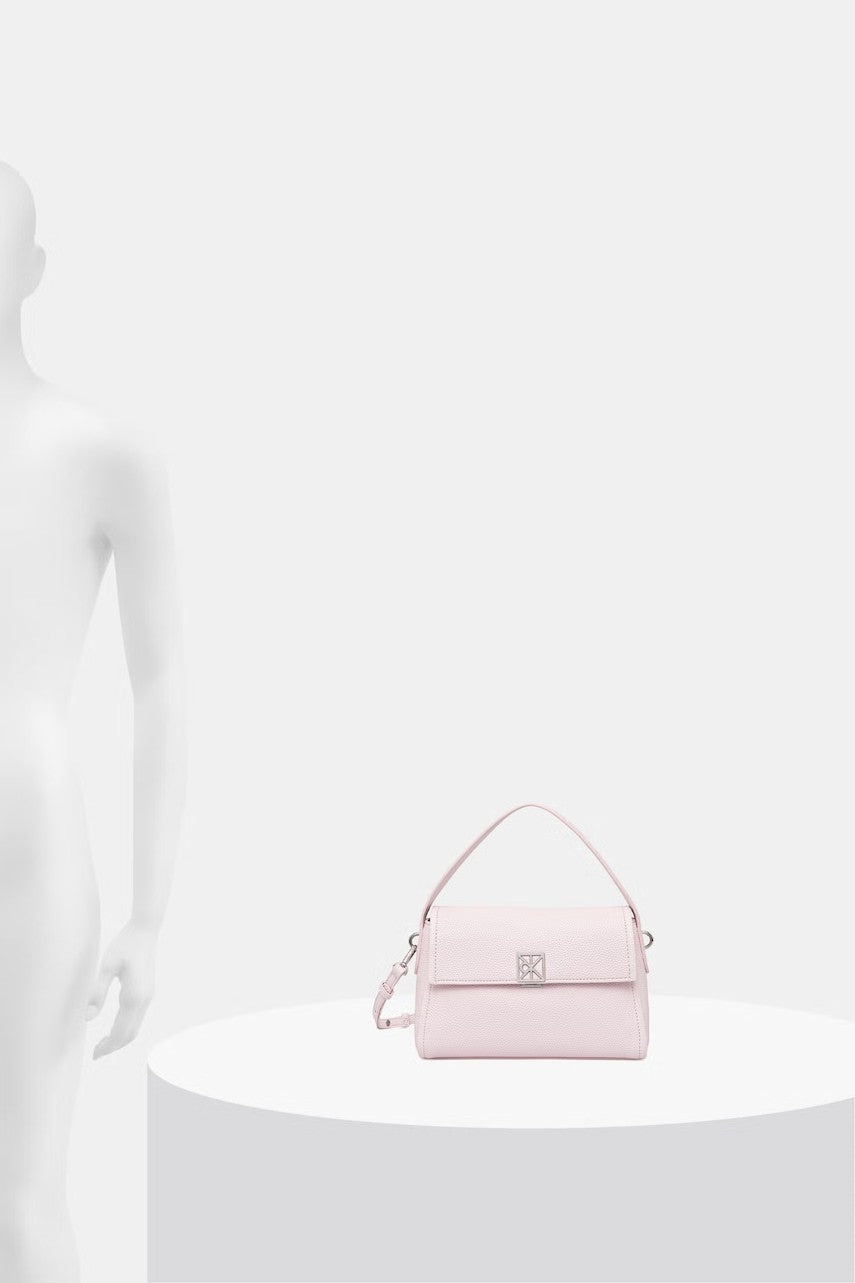Calvin Klein blijedoružičasta ženska torbica