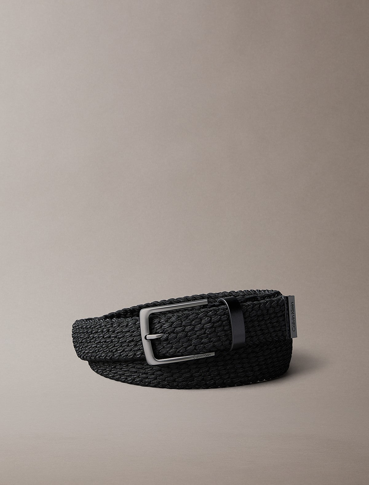 Calvin Klein crni muški pleteni kaiš
