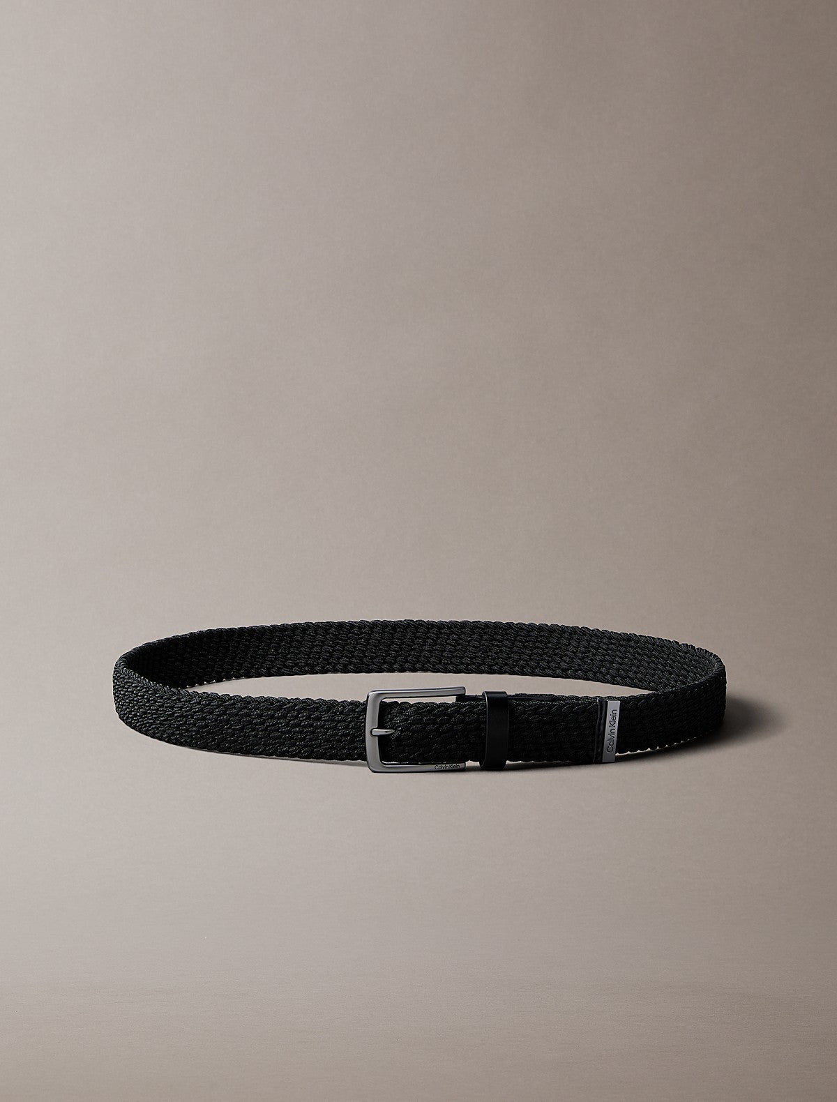 Calvin Klein crni muški pleteni kaiš